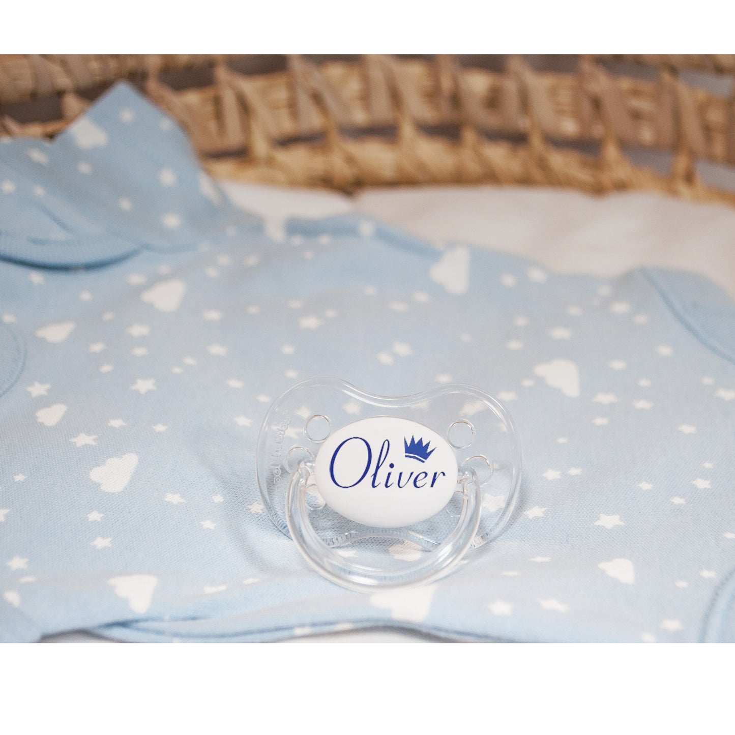 Personalised baby dummy with blue name and crown