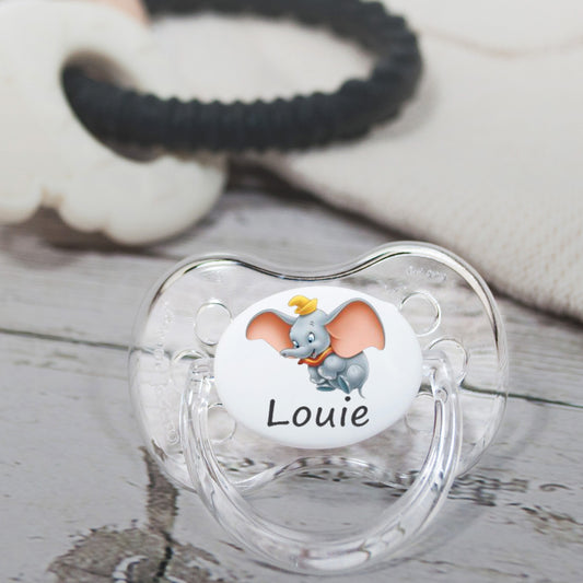 personalised baby dummy with image of dumbo and name