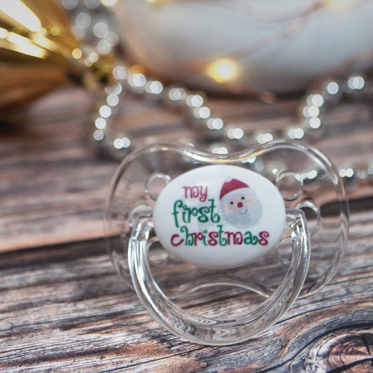 baby dummy with image of cute santa.